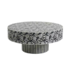 Elevate your living space with this stunning bone inlay coffee table, meticulously handcrafted by skilled artisans. Featuring a beautiful black and white floral pattern with a striking striped pedestal base, this unique piece is both functional and artistic. Made from tropical hardwood with intricate bone and resin inlay, this coffee table is sealed with a clear lacquer, ensuring durability and longevity. Its 36-inch diameter and elegant design make it a perfect centerpiece for any living room, offering a luxurious touch to both modern and traditional interiors.