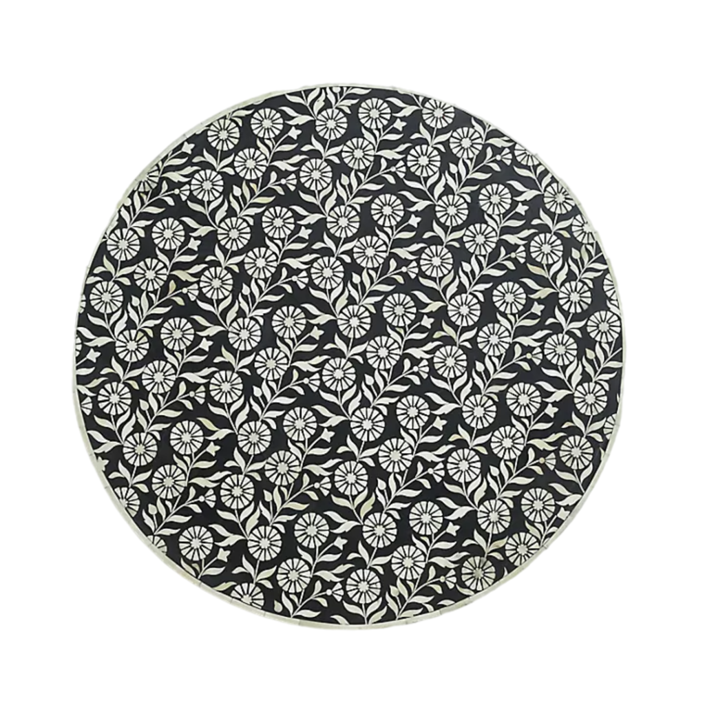 Elevate your living space with this stunning bone inlay coffee table, meticulously handcrafted by skilled artisans. Featuring a beautiful black and white floral pattern with a striking striped pedestal base, this unique piece is both functional and artistic. Made from tropical hardwood with intricate bone and resin inlay, this coffee table is sealed with a clear lacquer, ensuring durability and longevity. Its 36-inch diameter and elegant design make it a perfect centerpiece for any living room, offering a luxurious touch to both modern and traditional interiors.